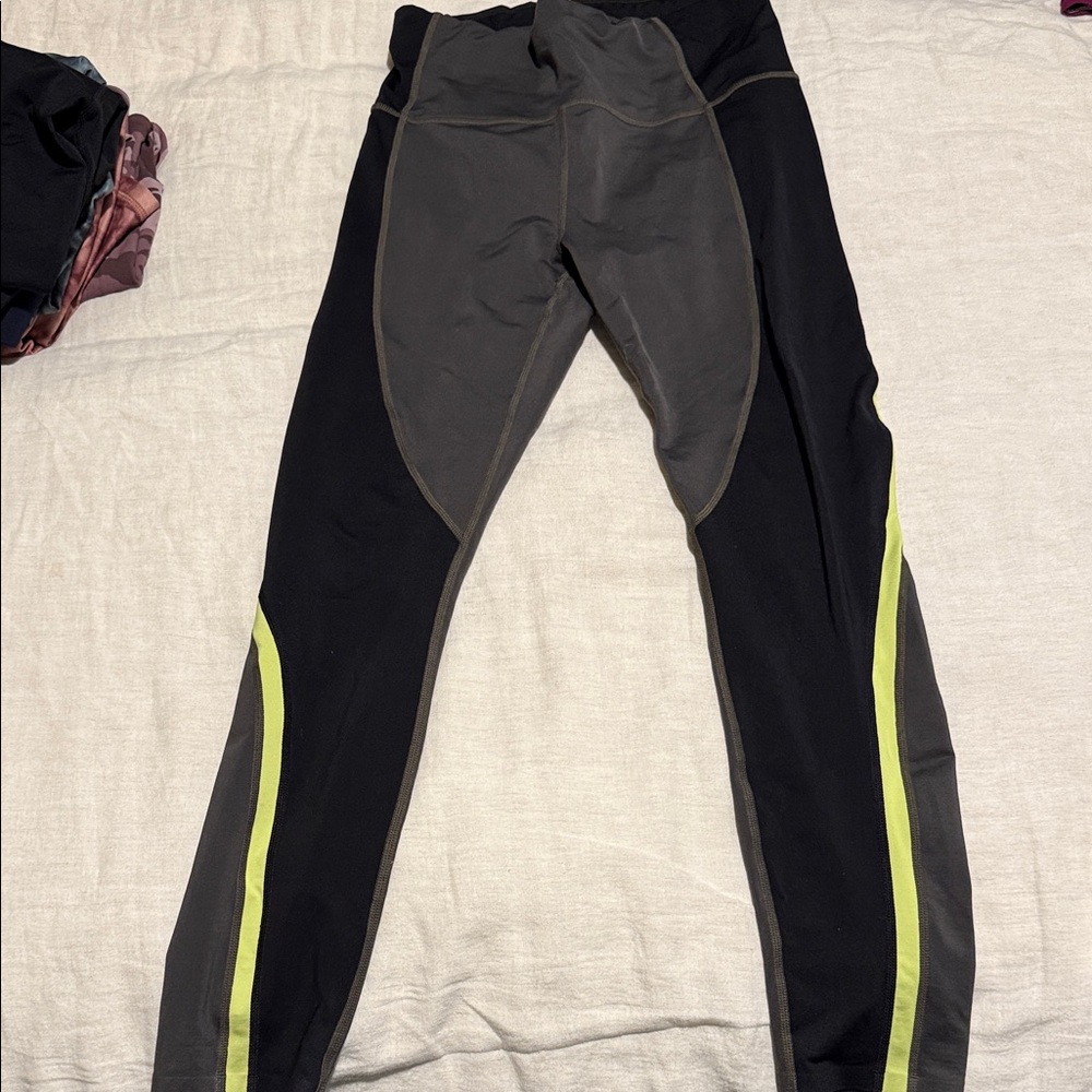 Athleta Black and Gray Leggings with Yellow Accents